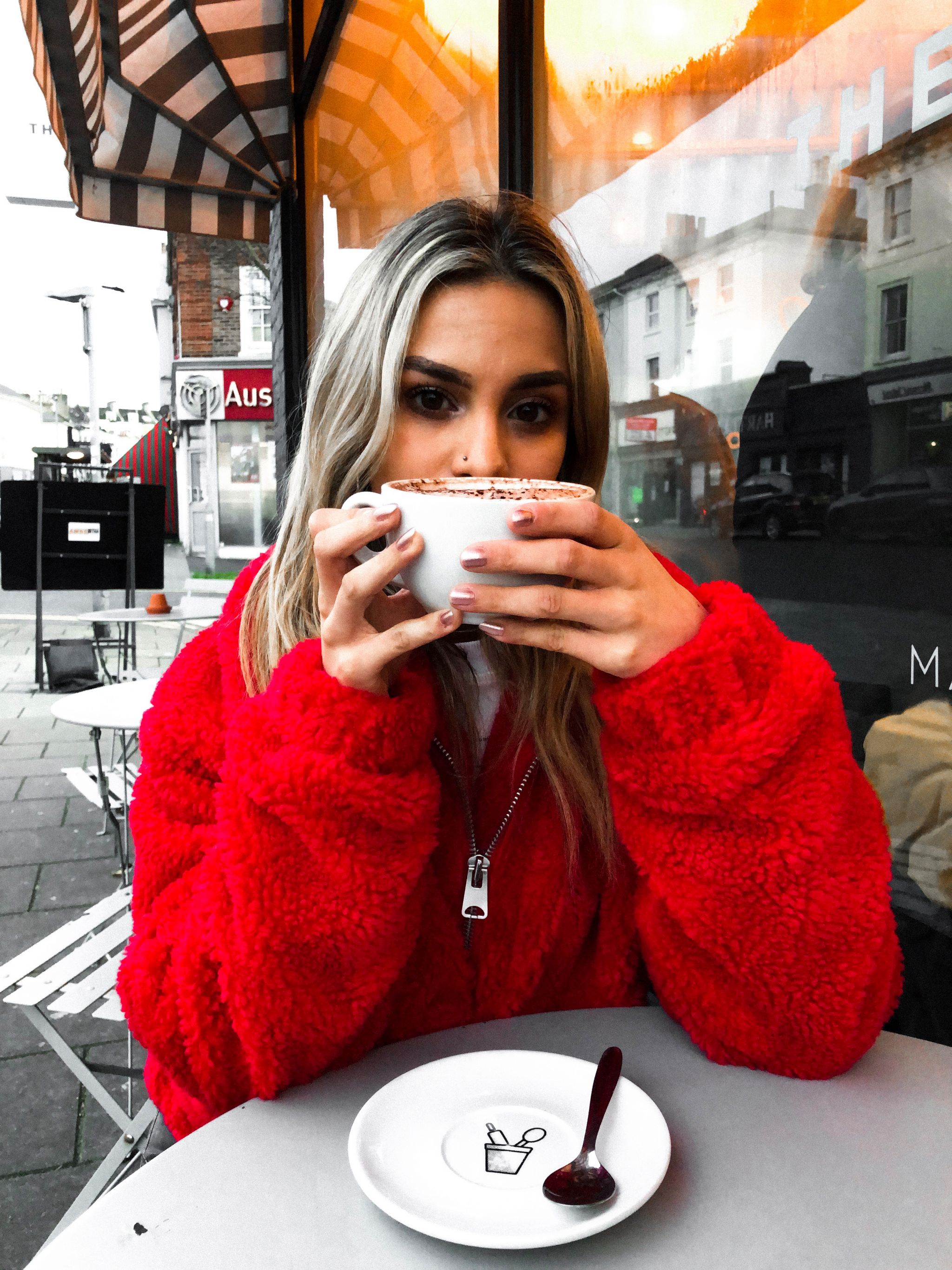 yasmin stefanie red teddy coat urban outfitters
